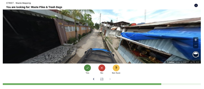 An image from street level, where one can look for solid waste in the image.