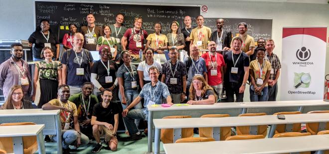 HOT Voting Members together at a Birds of a Feather Session at State of the Map 2022 in Firenze, Italy - Photo courtesy of Tyler Radford.
